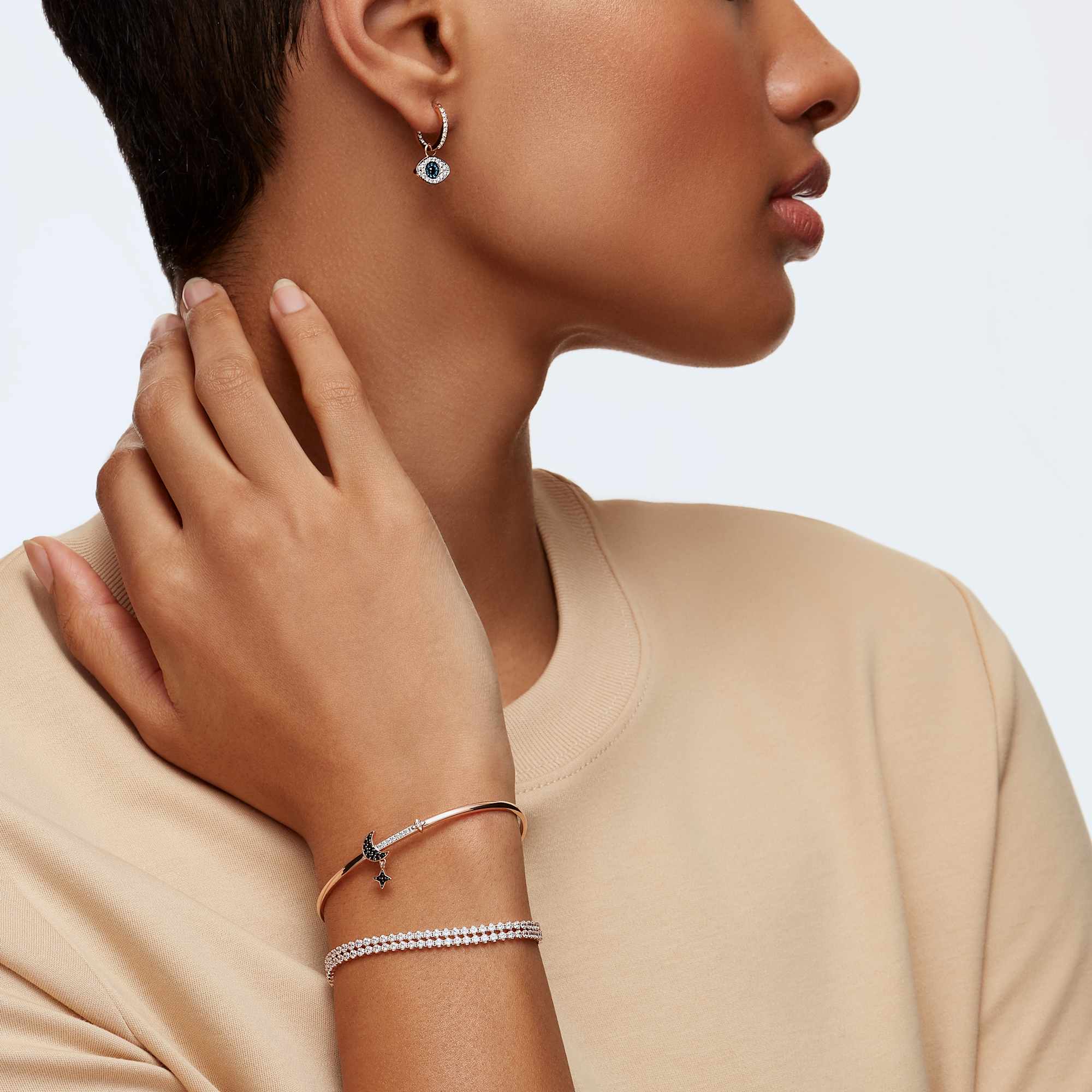 עגילי Swa Symbol רוז גולד מבריק SWAROVSKI